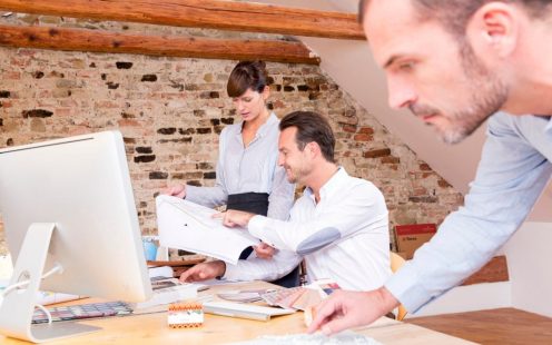 Architects working in their office