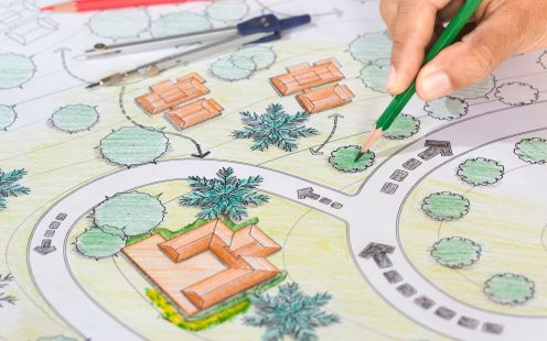 Landscape Architect Designs Blueprints For Resort.